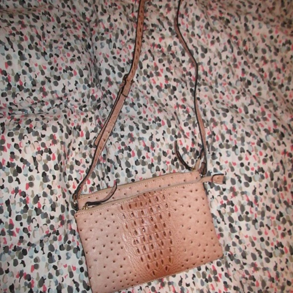 Pink alligator print purse